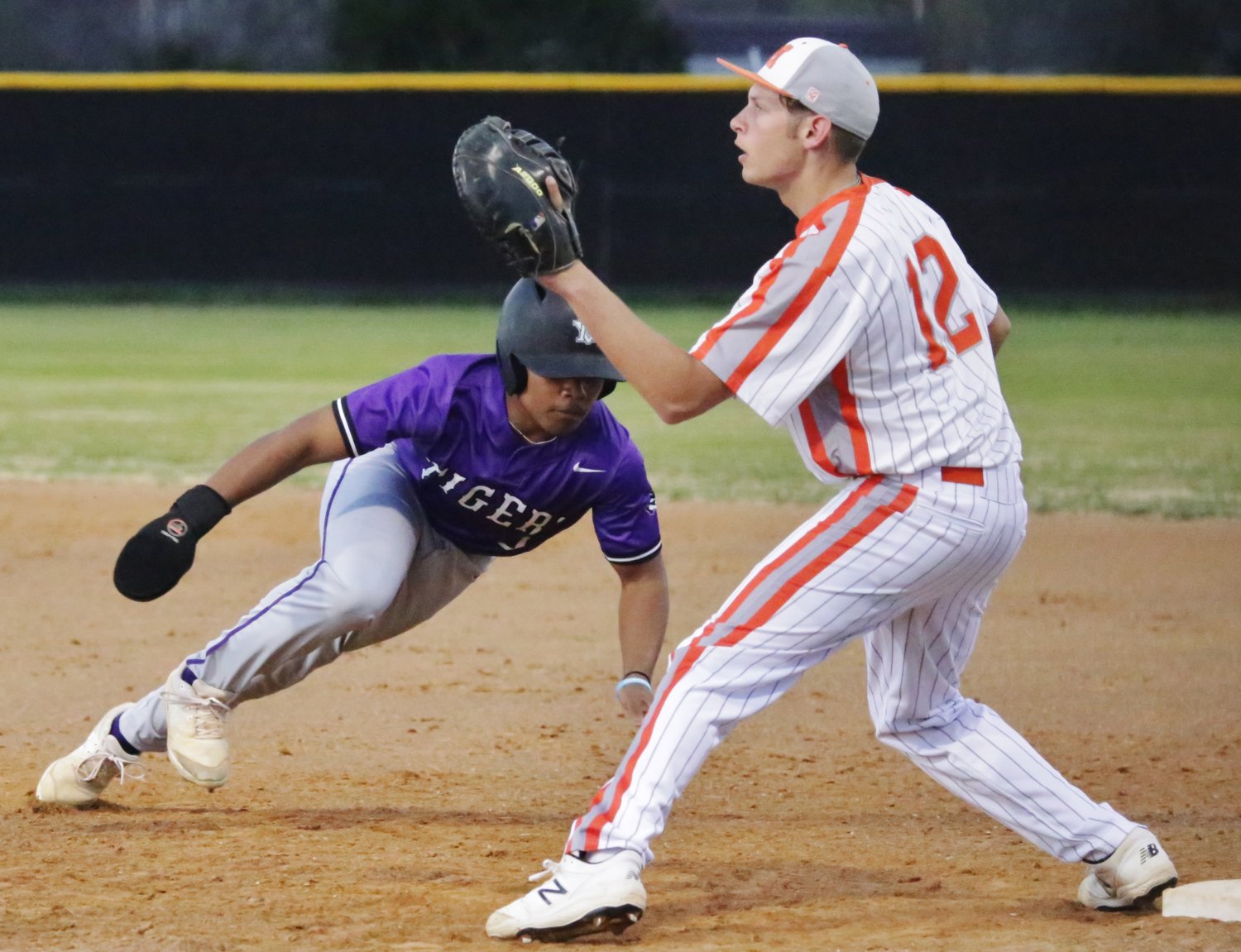 Kaden Bell picks off a Mt Vernon base runner at first base to close the top of the third inning last Friday. First baseman Jacob Castleberry made a smooth tag on a great throw for the out.